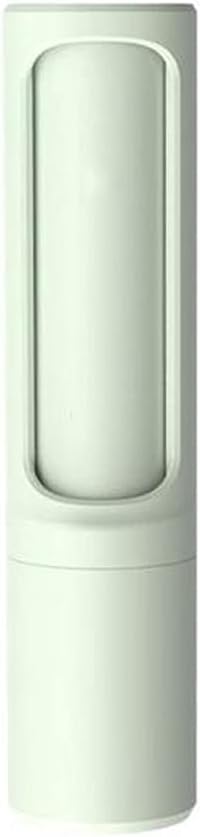 Cette brosse textile se presente en coloris vert